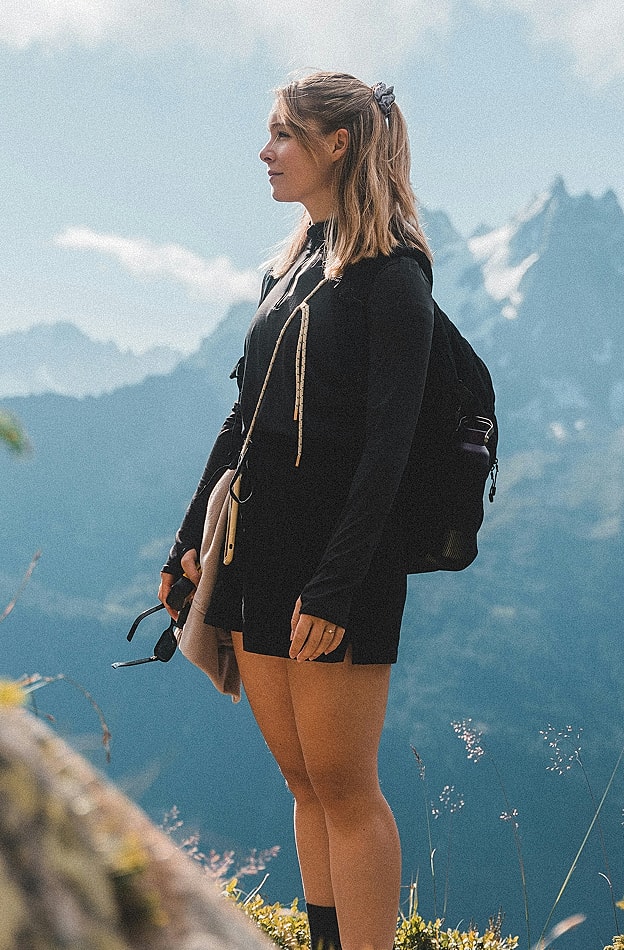 Hiker enjoying a scenic mountain view.